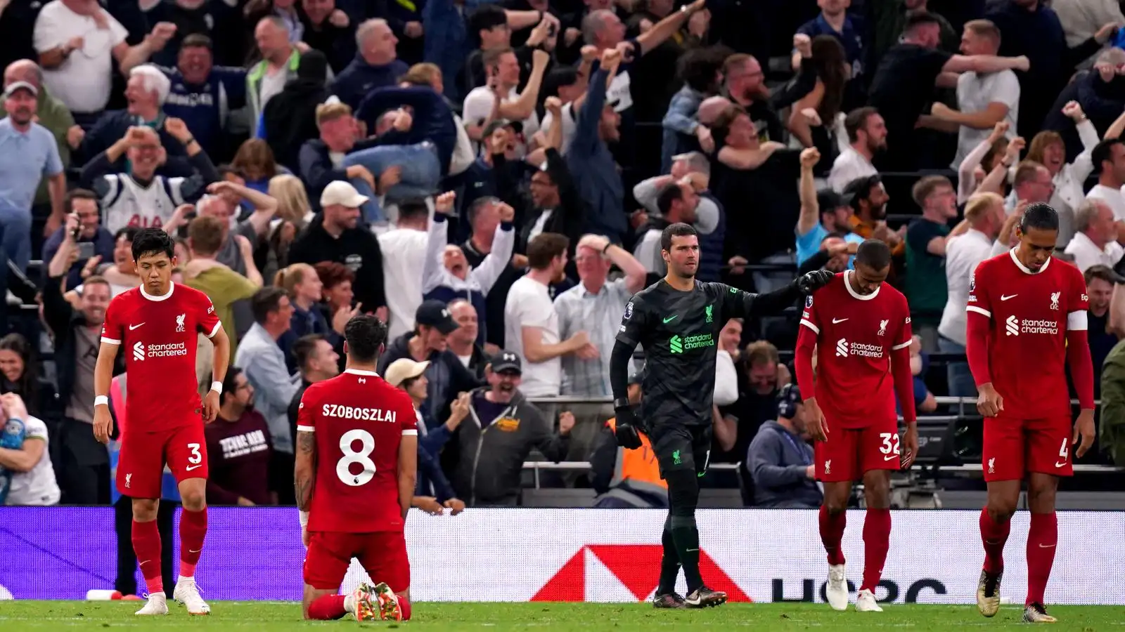 Liverpool players react after Joel Matip's late own goal condemns them to a 2-1 defeat at Tottenham