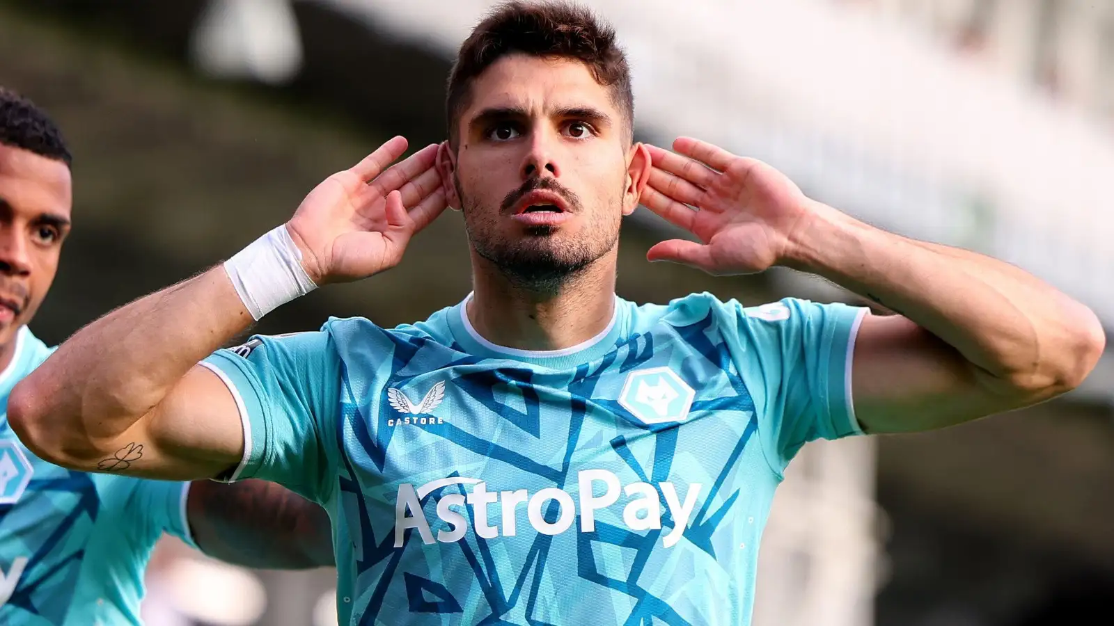 Pedro Neto celebrates scoring for Wolves.