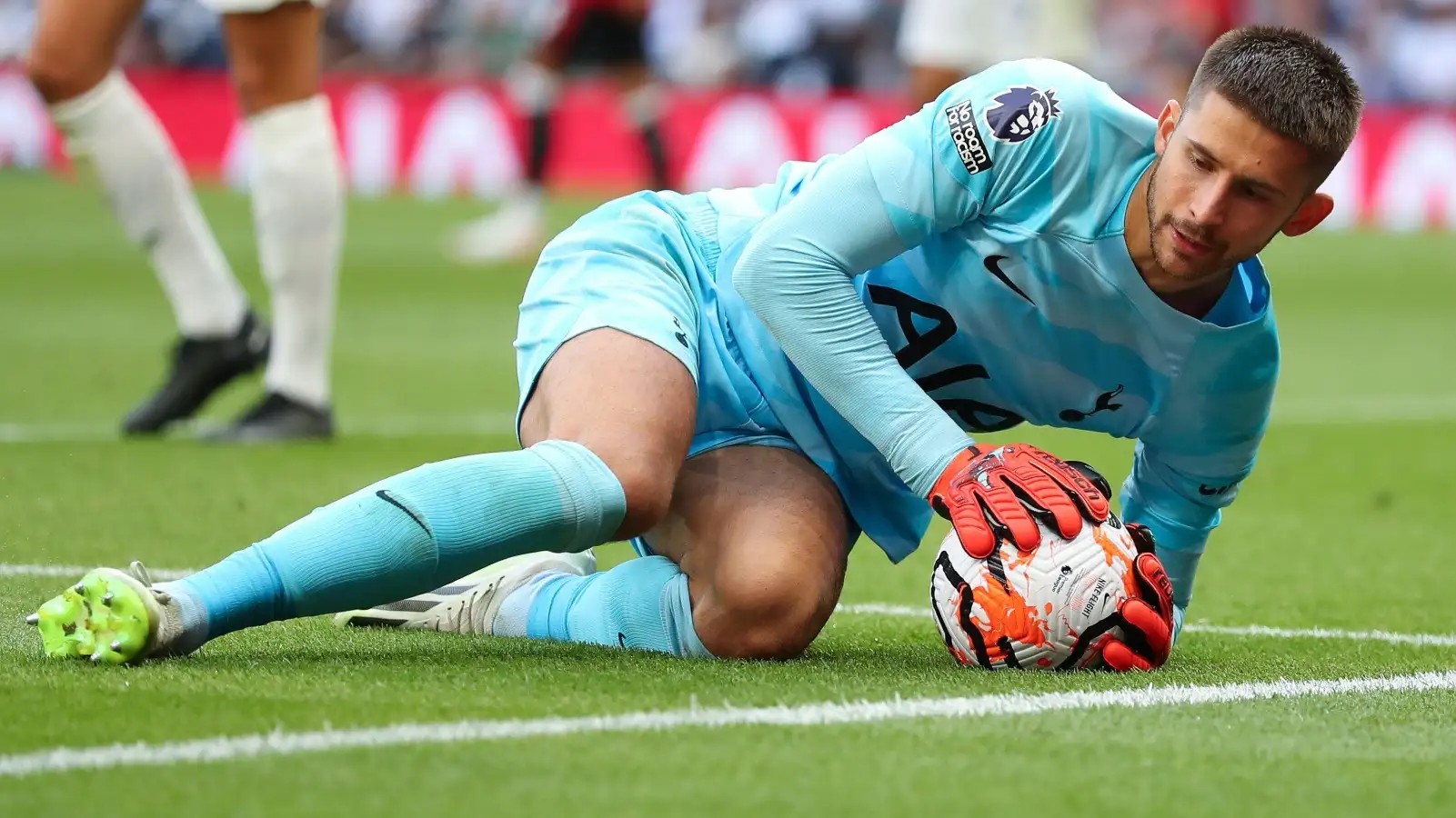 Tottenham goalkeeper Guglielmo Vicario conducts a preserve.