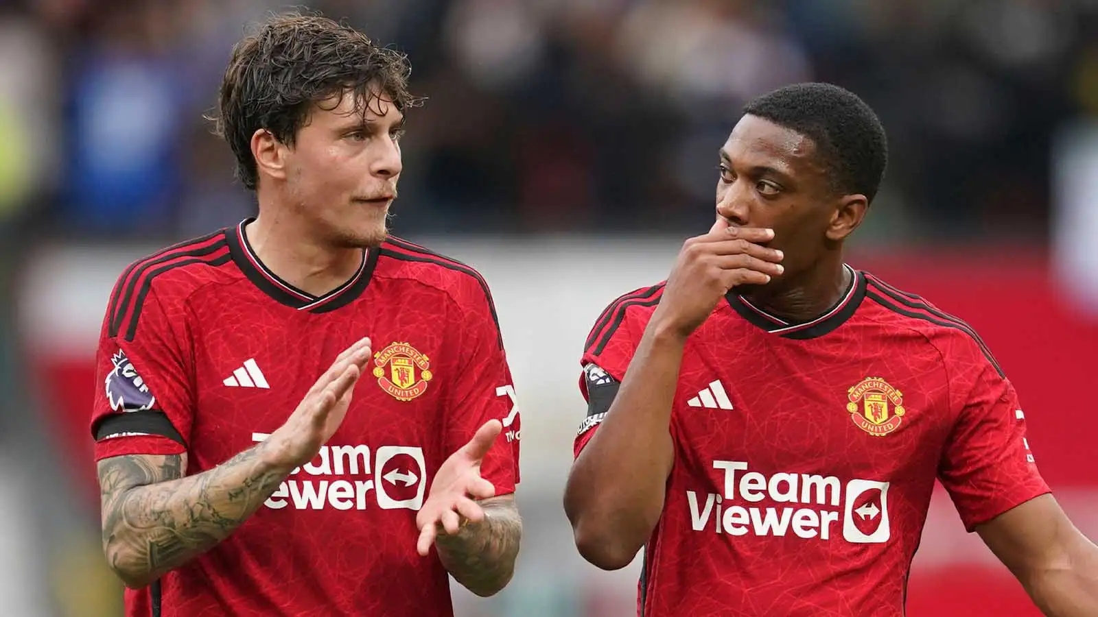 Manchester United's Victor Lindelof, left, and Anthony Martial