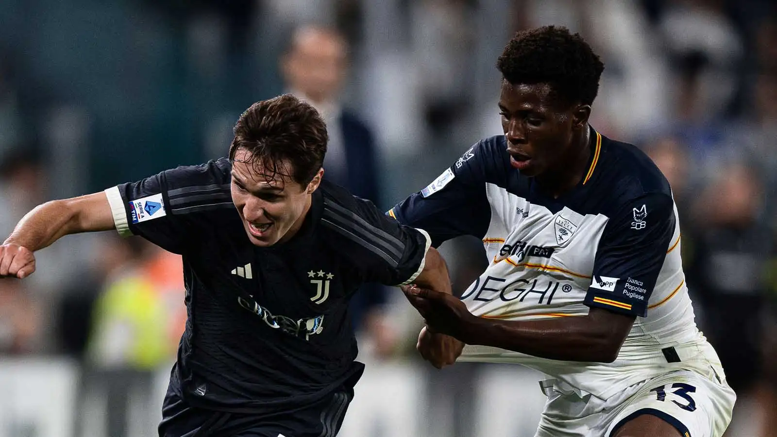 Federico Chiesa of Juventus FC competes for the sphere with Patrick Dorgu of US Lecce