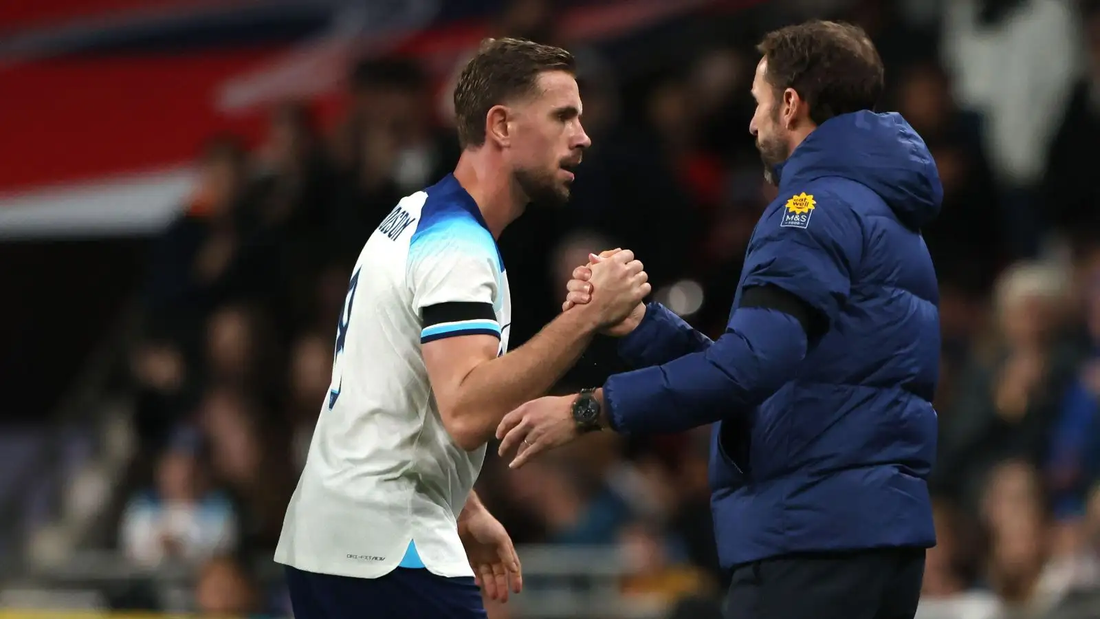 Southgate defends 'committed' England star Henderson after Wembley boos - 'It defies logic' 1 Jordan Henderson drinks hands through Gareth Southgate.