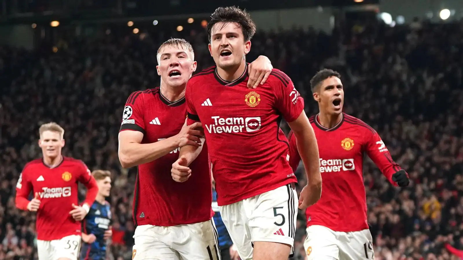 Manchester Joined defender Harry Maguire celebrates racking upward a ambition.