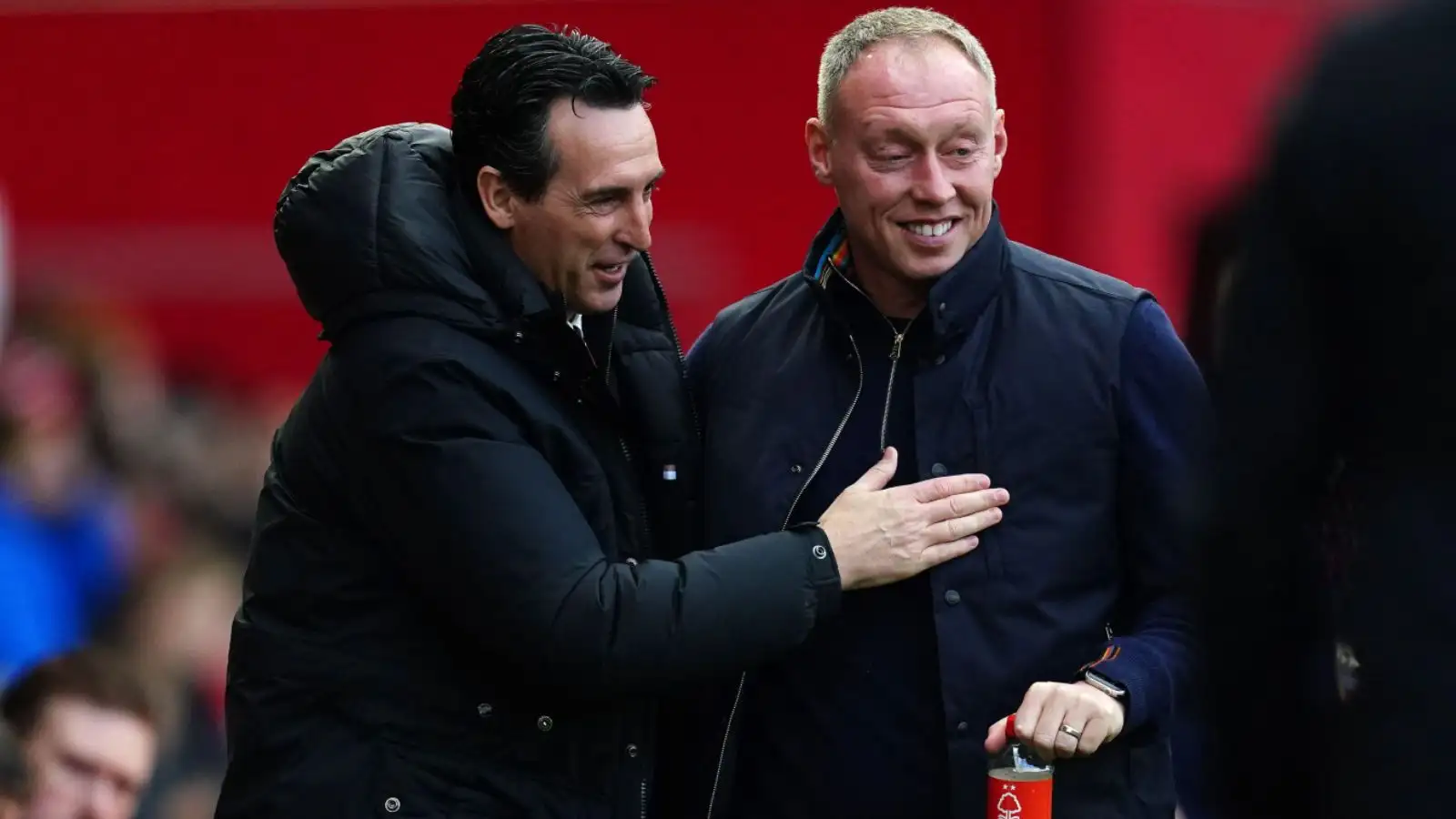 Aston Suite head preceptor Unai Emery and also Nottingham Forest supervisor Steve Cooper before a Premier League match.