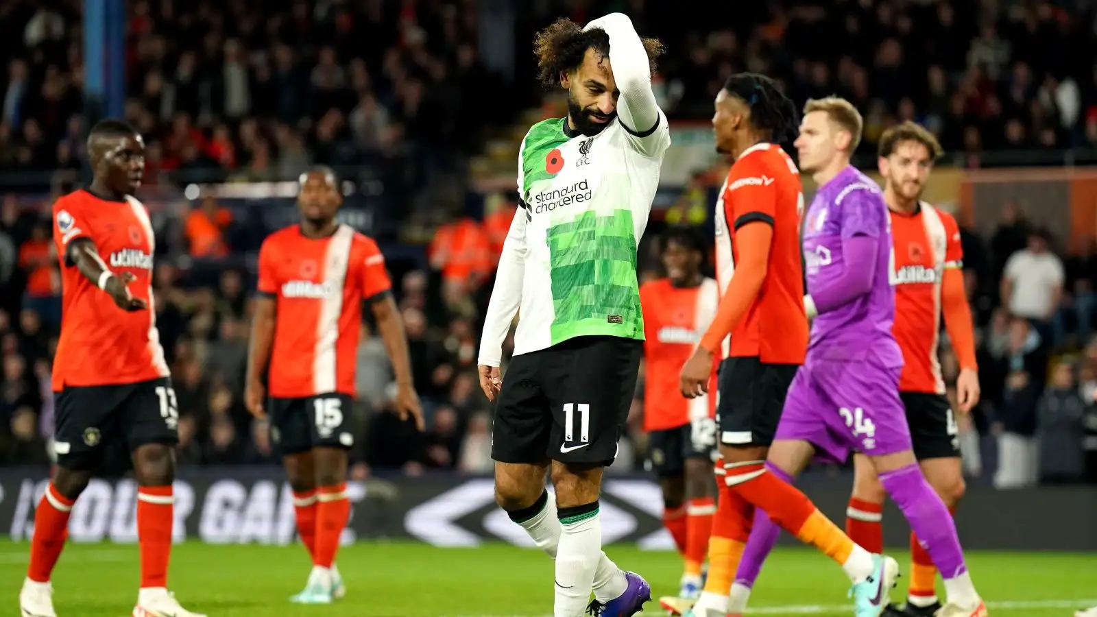 Liverpool forward Mo Salah reacts