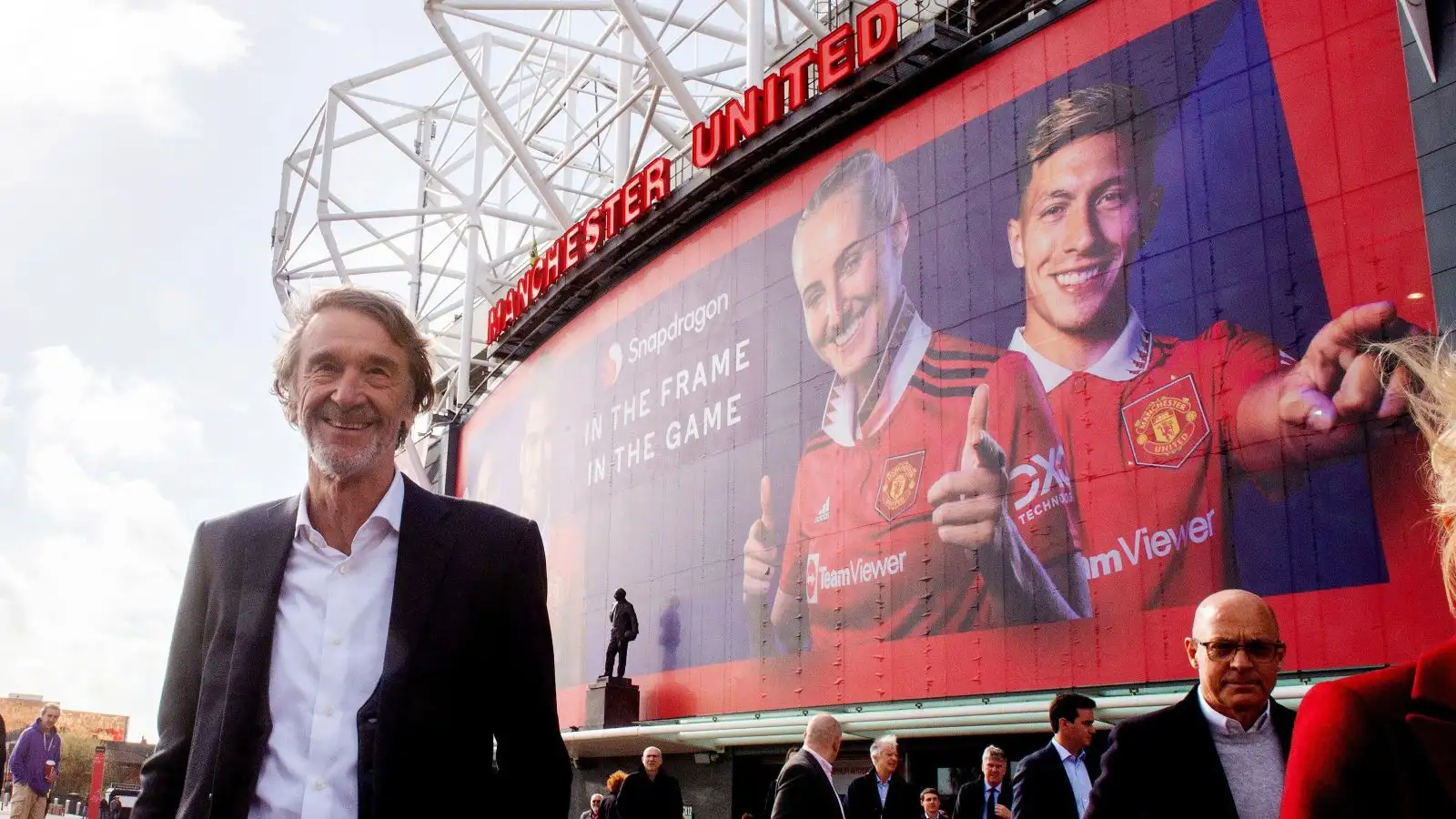 Sir Jim Ratcliffe standing outside Manchester United's Old Trafford stadium