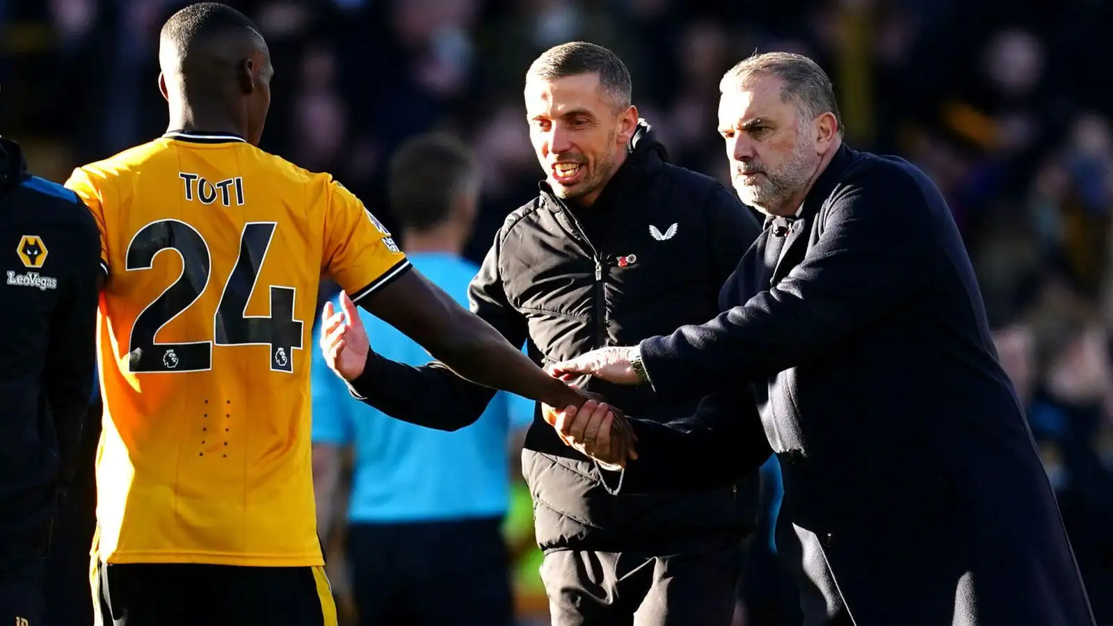 Tottenham manager Ange Postecoglou and also Wolves head train Gary O'Neil after a match.