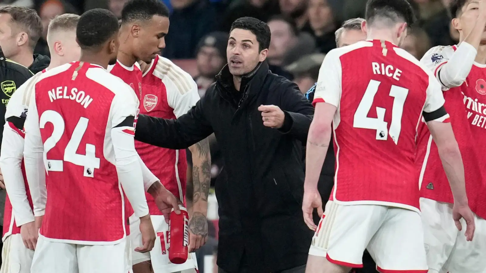 Mikel Arteta talks to his Arsenal players during the win over Burnley.