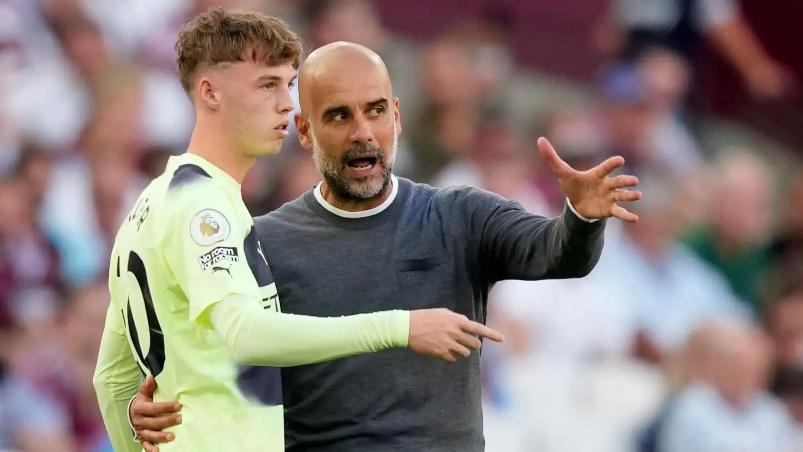 Pep Guardiola and Cole Palmer