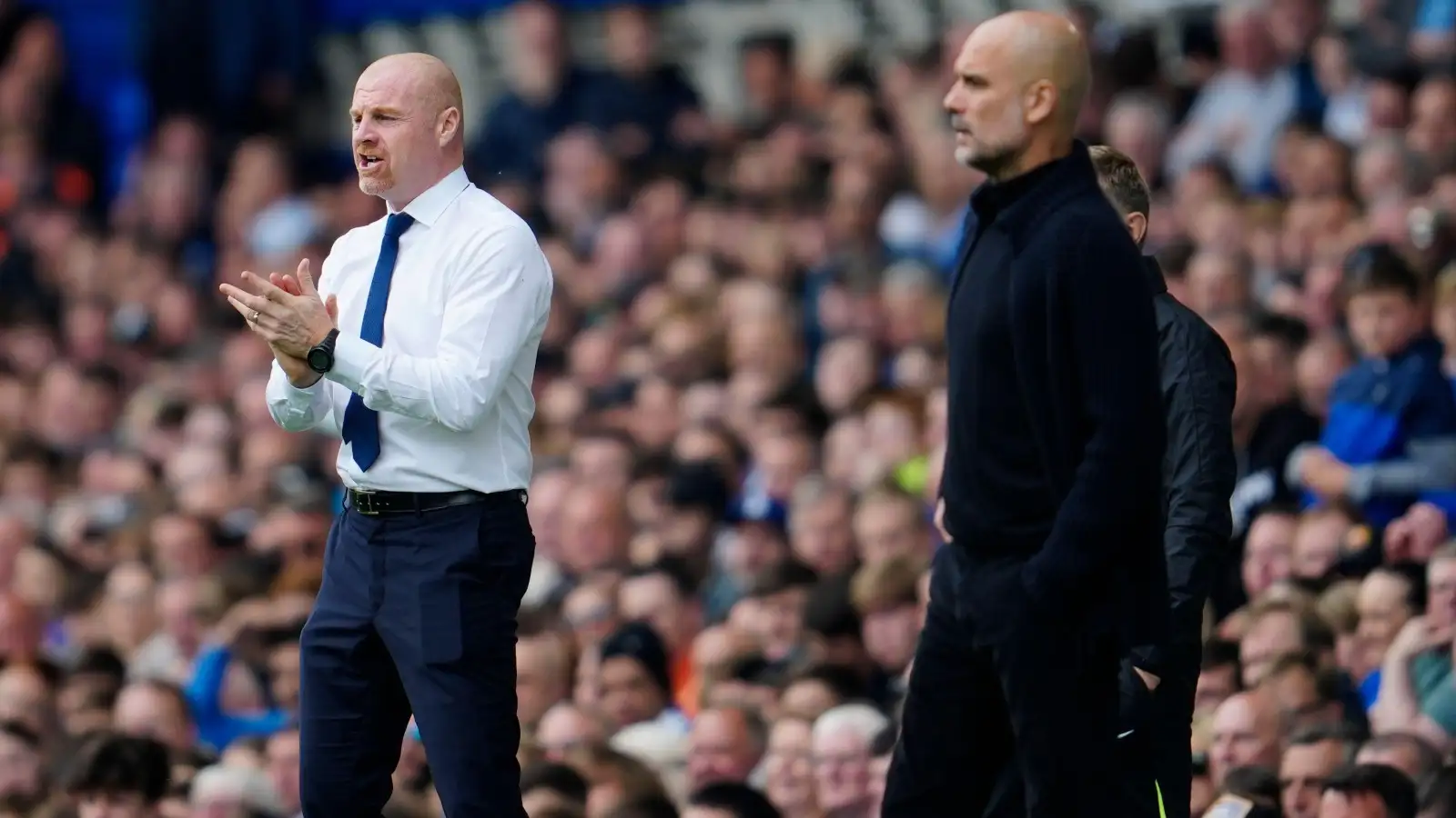 Sean Dyche and Pep Guardiola on the touchline while Everton face Manchester City.