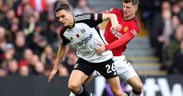 Fulham midfielder Joao Palhinha and Mason Mount battle for the ball.