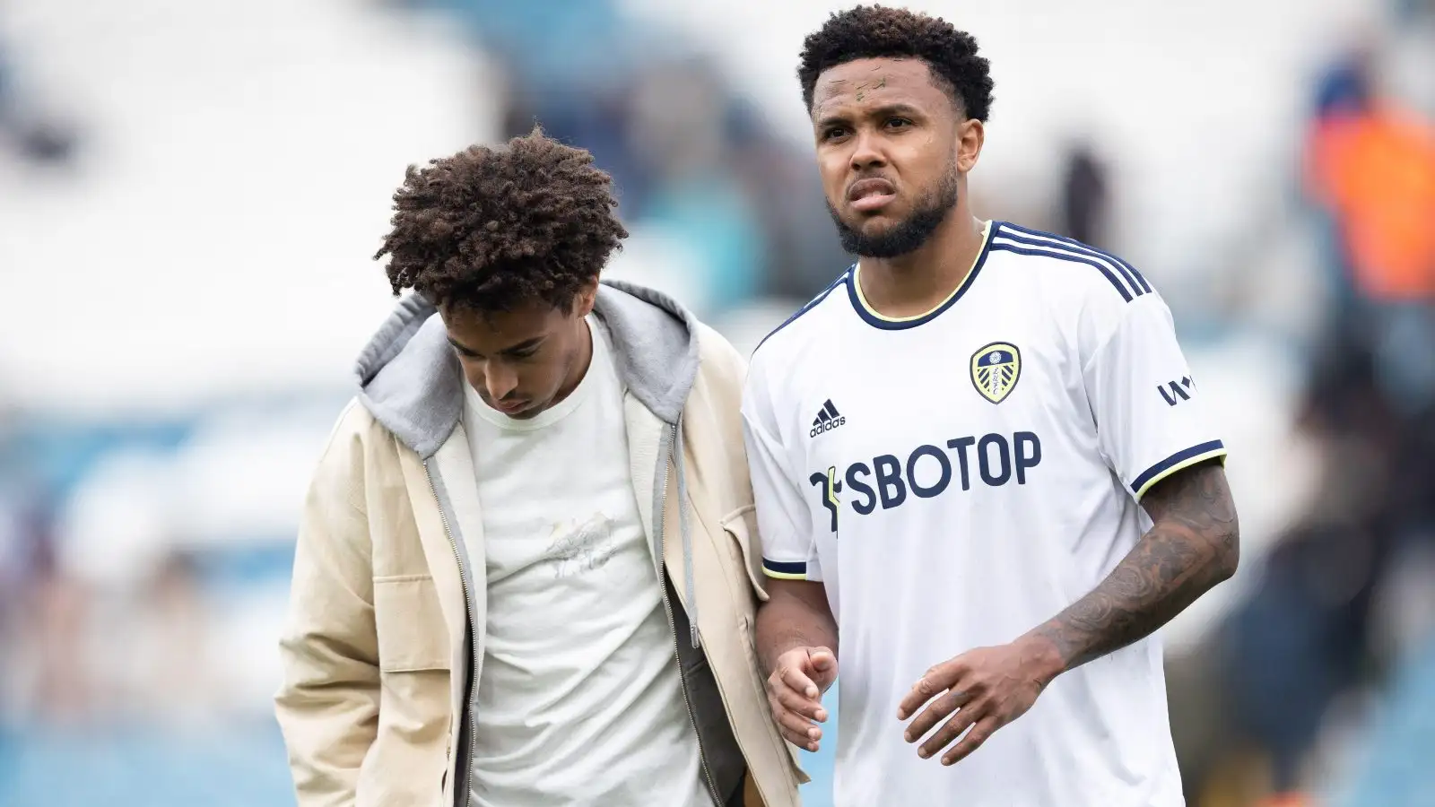 Weston McKennie and Tyler Adams sift dejected after a loss.