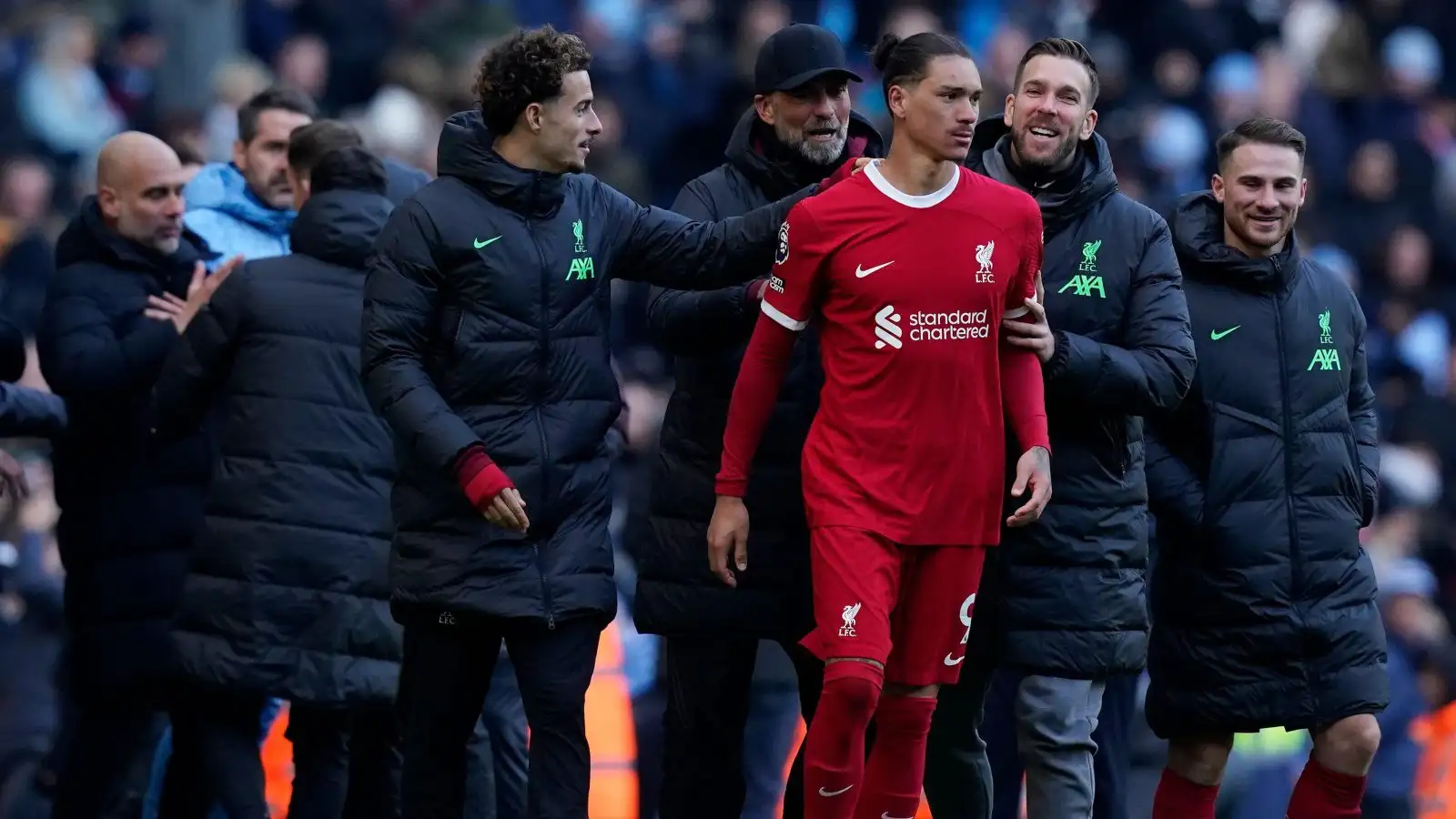 MANCHESTER, UK. 25th Nov, 2023. Darwin Nunez of Liverpool is led away by group associates after exchanging words via Josep Guardiola advisor of Manchester Metropolis (L) at the last whistle throughout the Premier League matched at the Etihad Stadium, MANCHESTER.