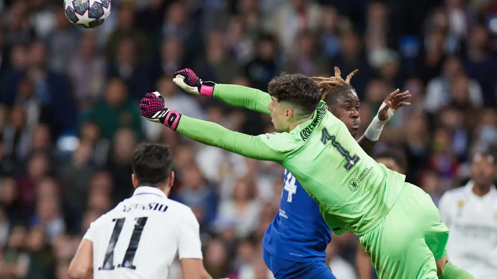 Chelsea goalkeeper Kepa Arrizabalaga punches the ball clear.