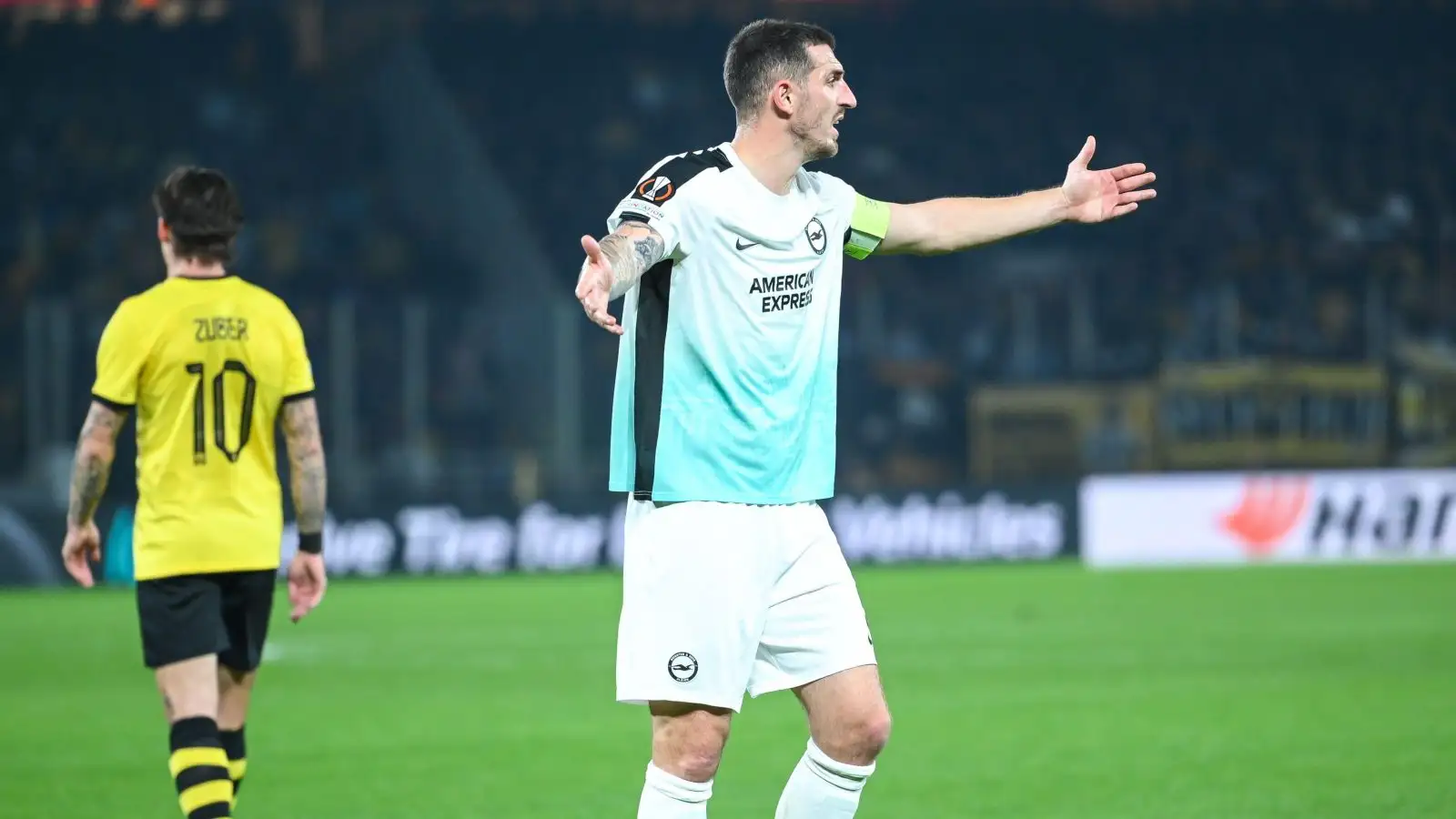 Brighton captain Lewis Dunk gestures during a match.
