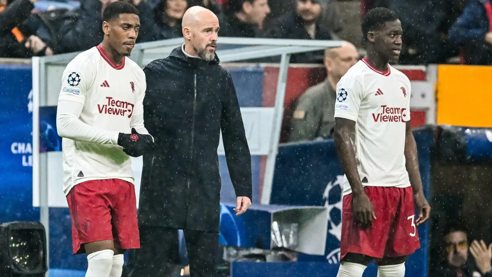 Erik ten Hag on the touchline with Anthony Martial and Kobbie Mainoo.