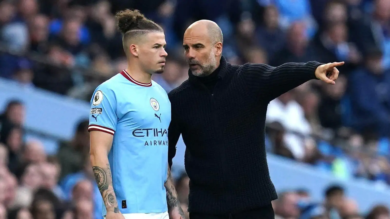c?url=https%3A%2F%2Fd2x51gyc4ptf2q.cloudfront.net%2Fcontent%2Fuploads%2F2023%2F12%2F08155117%2FManchester City manager Pep Guardiola speaks with Kalvin Phillips