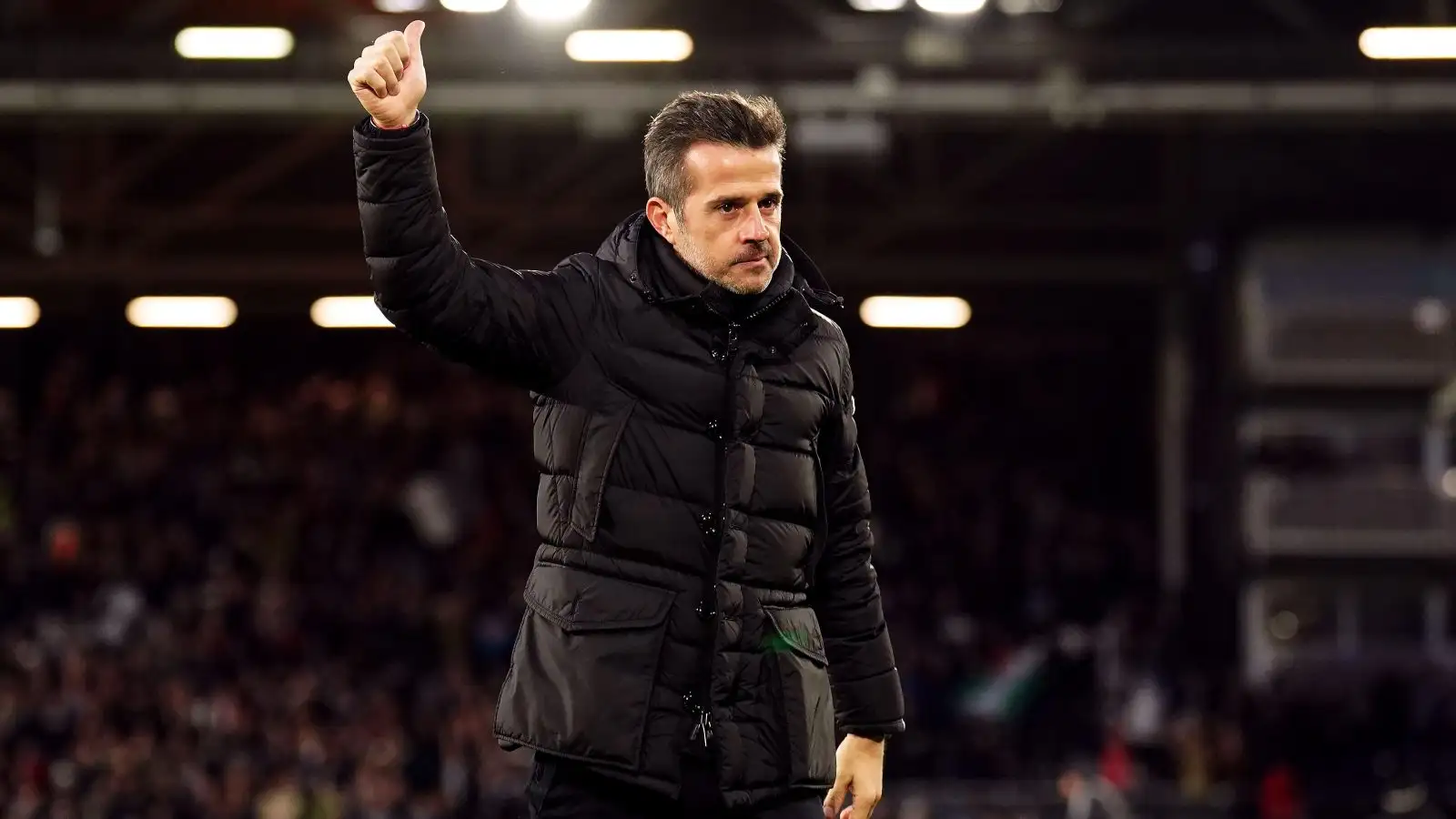 Fulham head professional Marco Silva confers the thumbs upwards to the supporters.