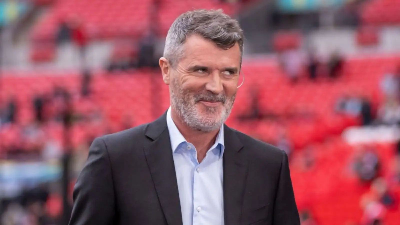 Roy Keane gives a cheeky smile during ITV coverage.
