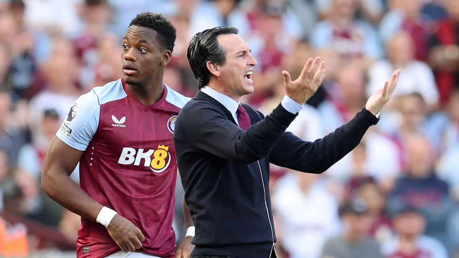 Unai Emery motions while Jhon Duran prepares to come on.
