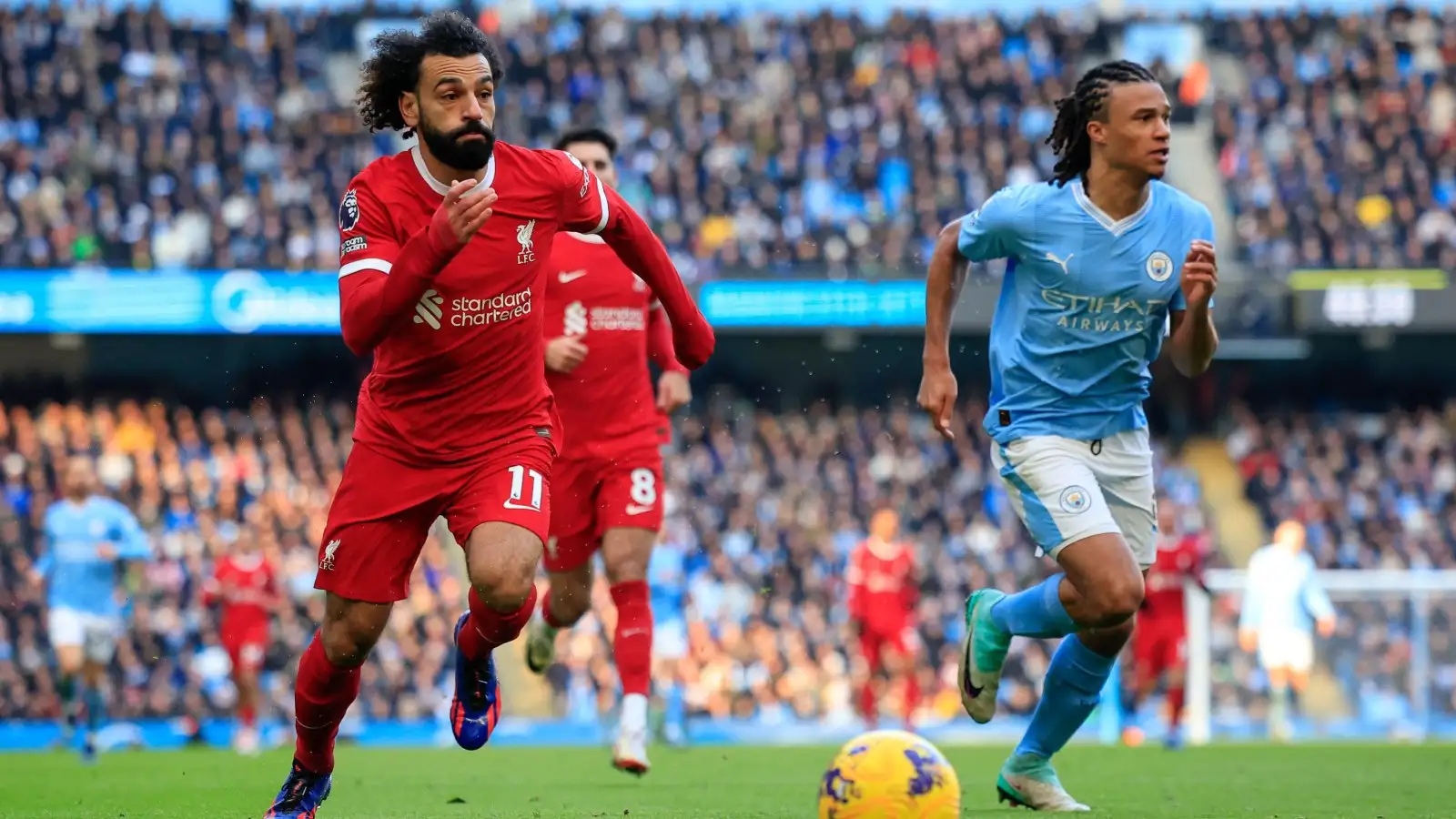 c?url=https%3A%2F%2Fd2x51gyc4ptf2q.cloudfront.net%2Fcontent%2Fuploads%2F2024%2F01%2F22150910%2FMo Salah of Liverpool and Nathan Ake of Man City race