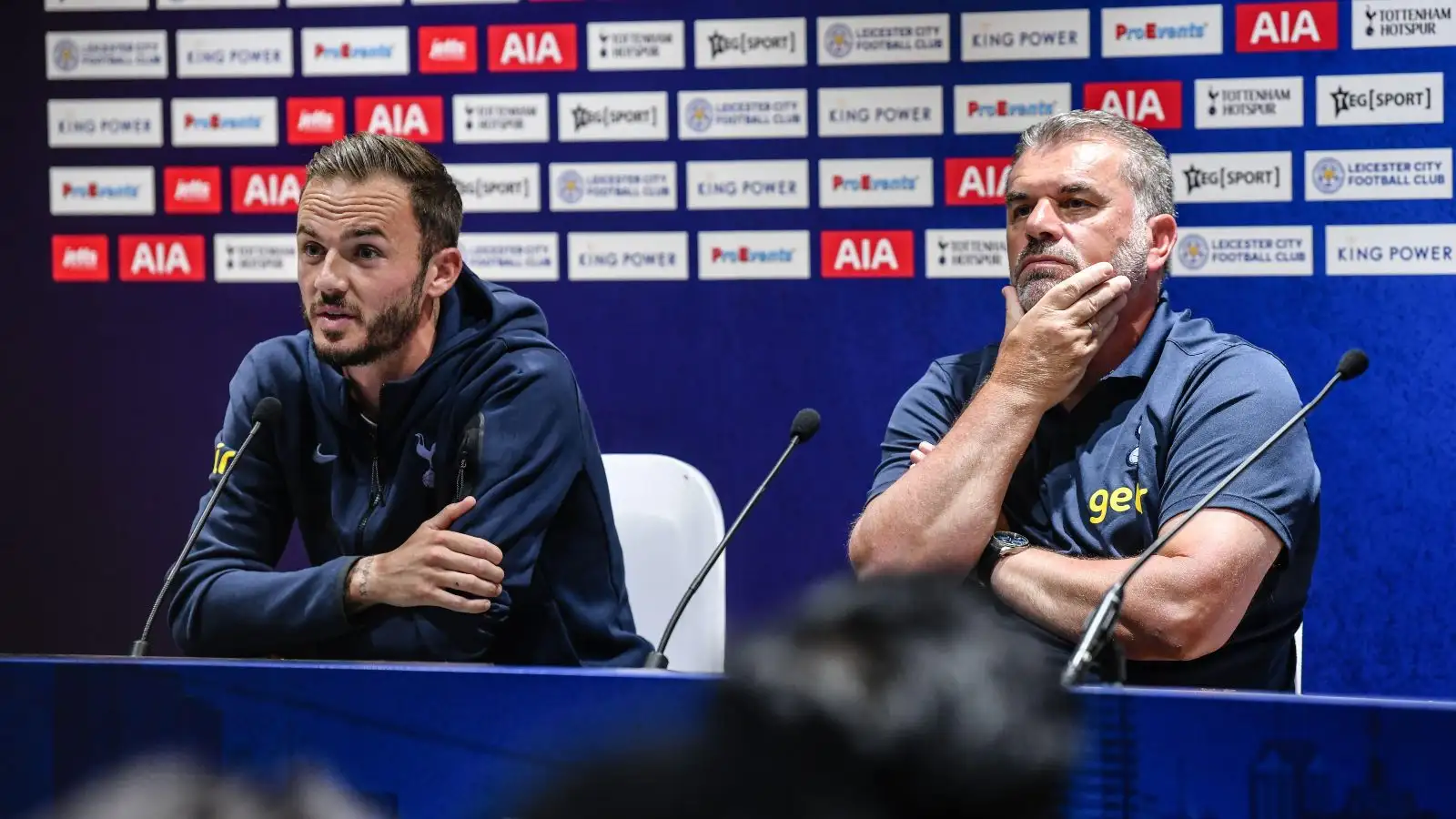 Tottenham midfielder James Maddison and Ange Postecoglou during a press conference in Bangkok.