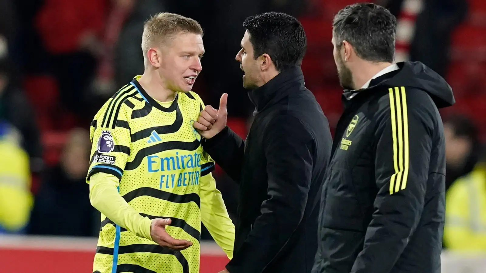 Arsenal protector Oleksandr Zinchenko is relaxed down by Mikel Arteta after the full-time whistle.