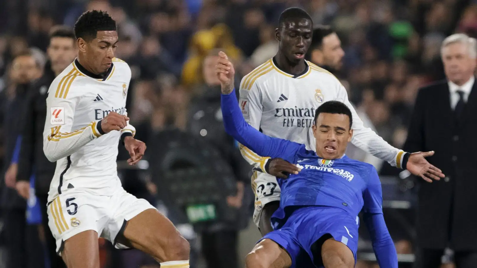 Real Madrid player Jude Bellingham clashes using Getafe striker Mason Greenwood, on loan from Guy Utd