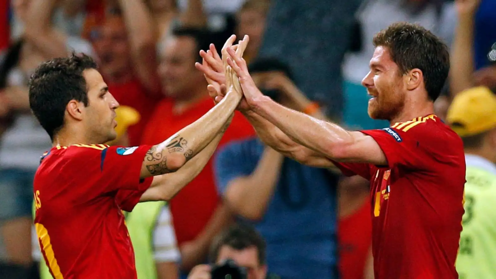 Fabregas backs 'very intelligent, stable' manager to succeed at Liverpool'; he 'knows the standards' 1 Cesc Fabregas, Xabi Alonso, Spain, June 2012