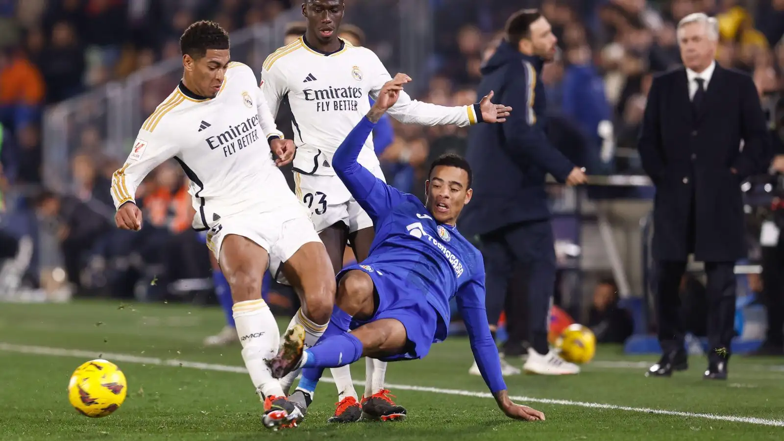 Male Utd loanee Mason Greenwood takes on Jude Bellingham