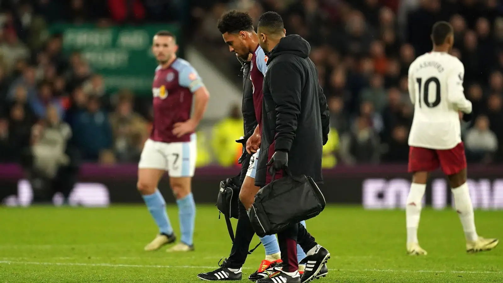 Aston Villa midfielder Boubacar Kamara limps off due to an injury.