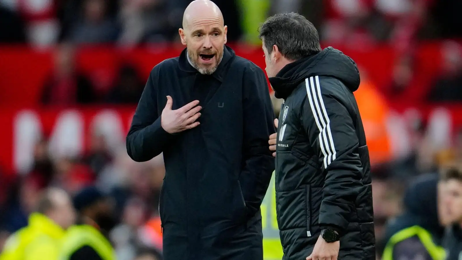 Guy Utd supervisor Erik ten Hag enumerates wearing Fulham peak dog Marco Silva during a match.