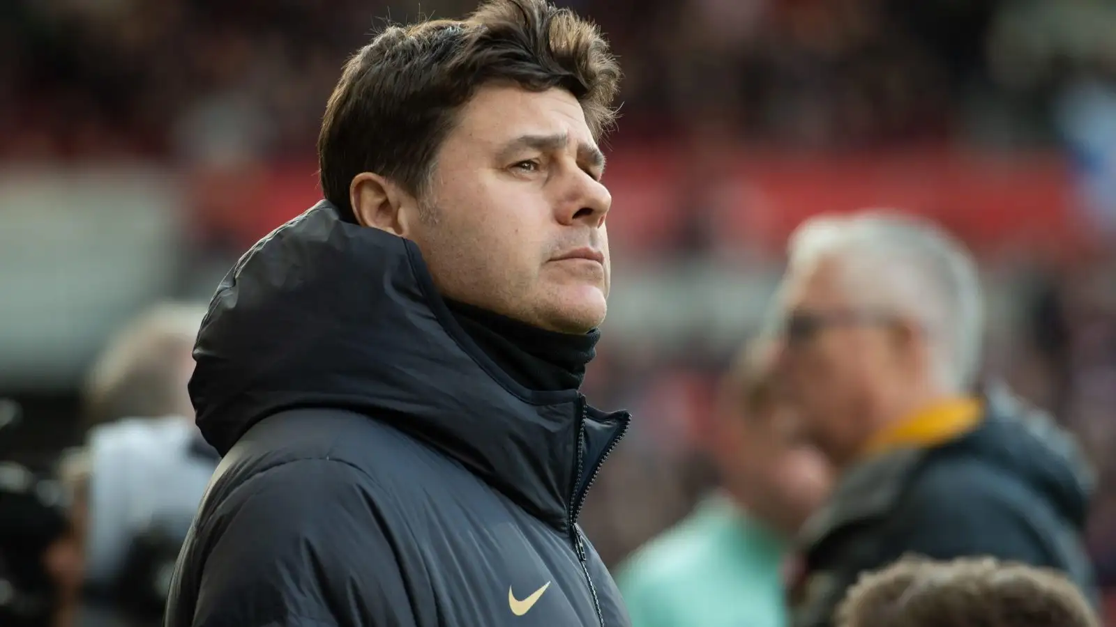 Mauricio Pochettino glances on throughout a suit.