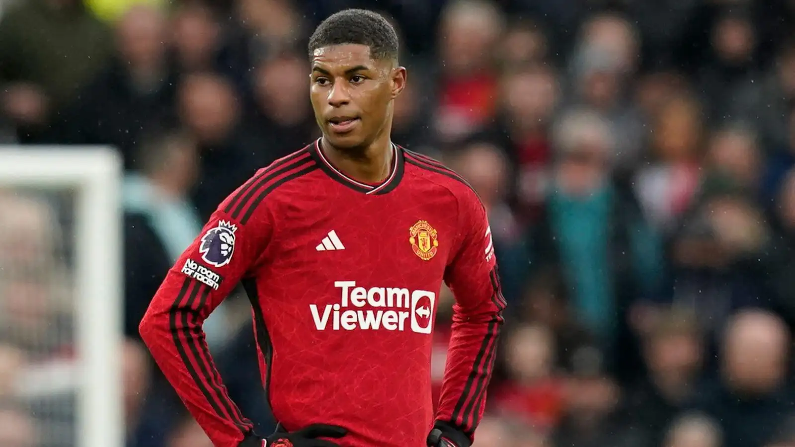 Male Utd onward Marcus Rashford aesthetics dejected during a match.