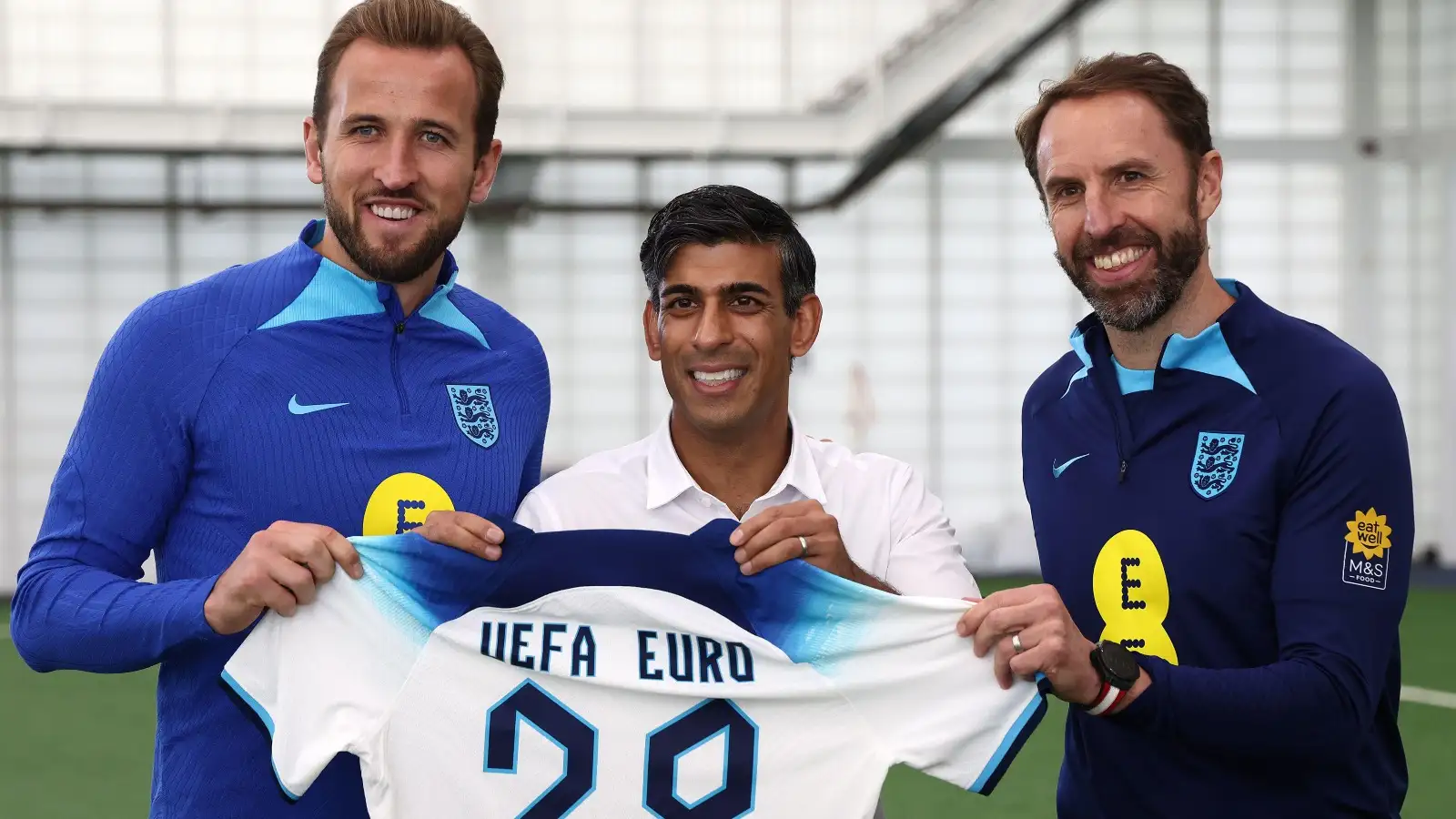 England kit: Flag furore illustrates why Three Lions will never win anything... 1 Harry Kane, Rishi Sunak as well as Gareth Southgate position via an England t shirt.