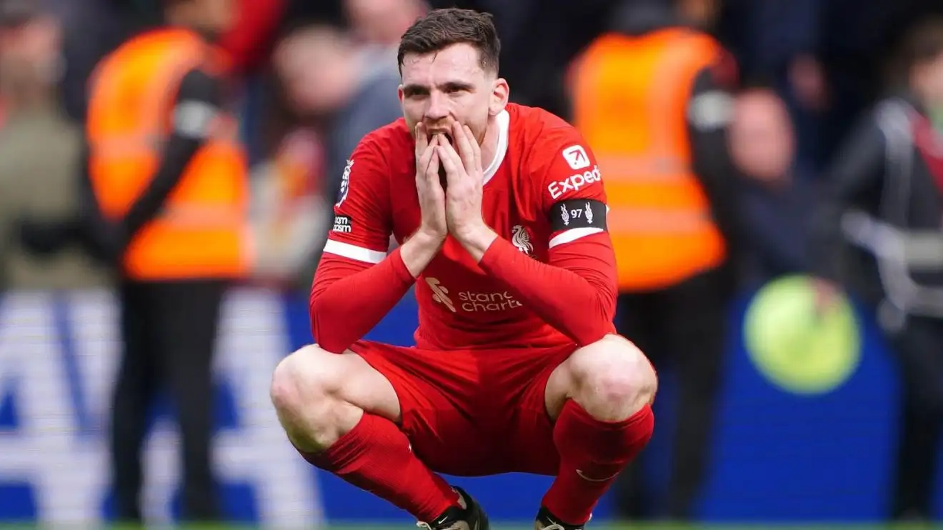 Liverpool vacated-recommend Andy Robertson ganders dejected after a defeat
