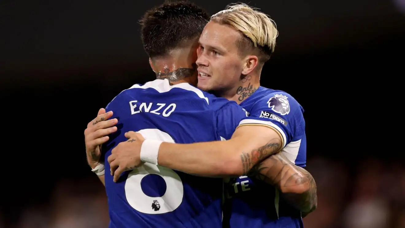 Chelsea winger Mykhaylo Mudryk hugs Enzo Fernandez