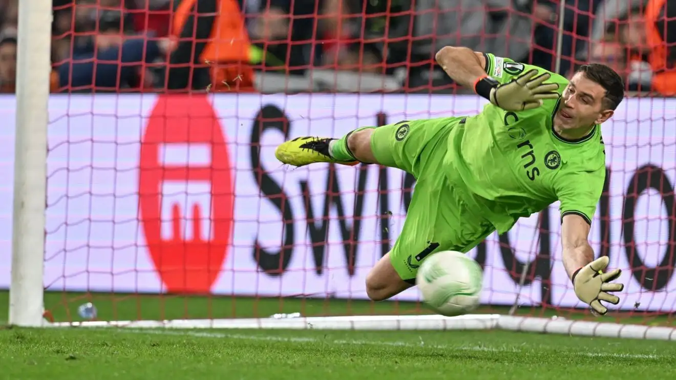 Emi Martinez saves a penalty as Aston Villa beat Lille in a Europa Conference shootout