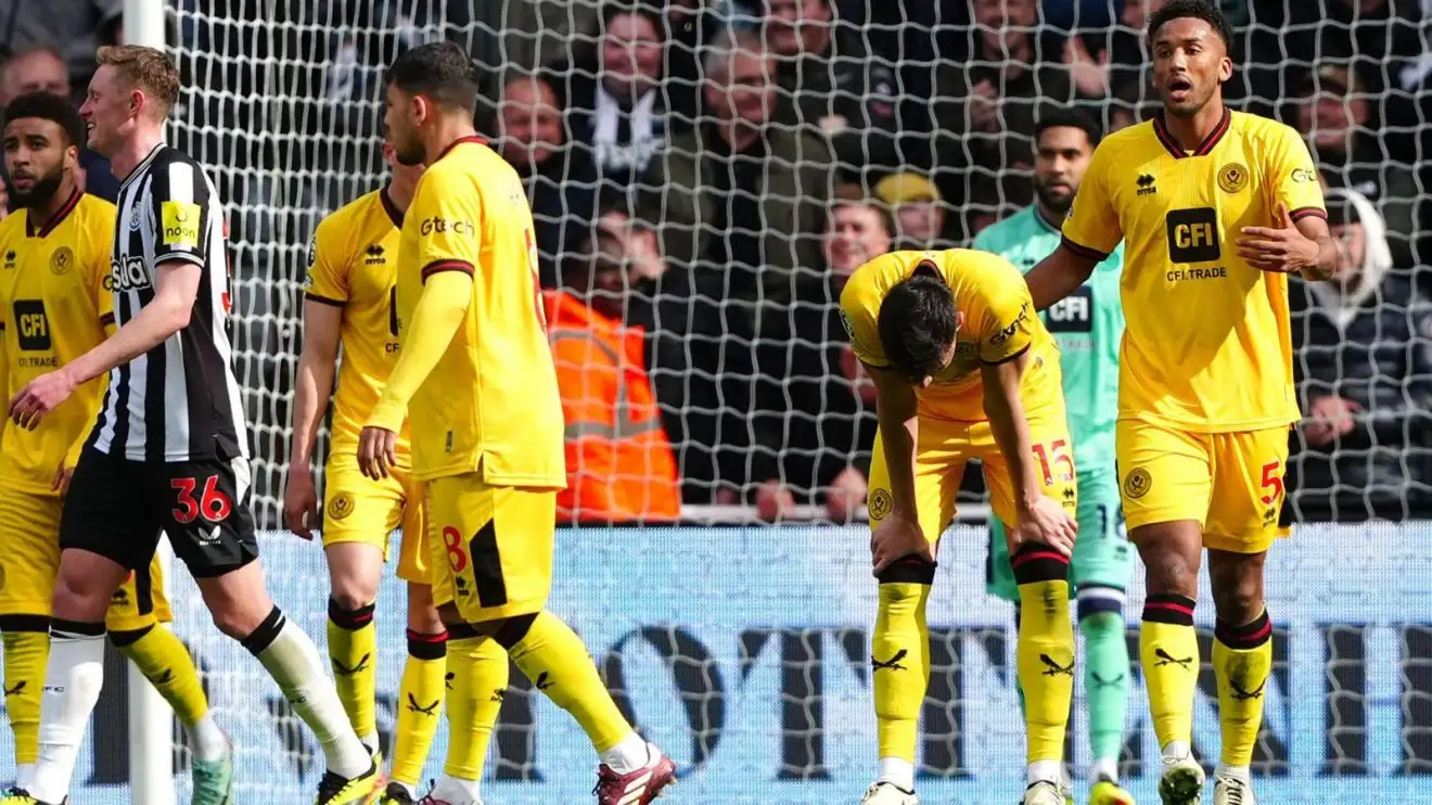 Sheffield United players attractiveness dejected after conceding a ambition