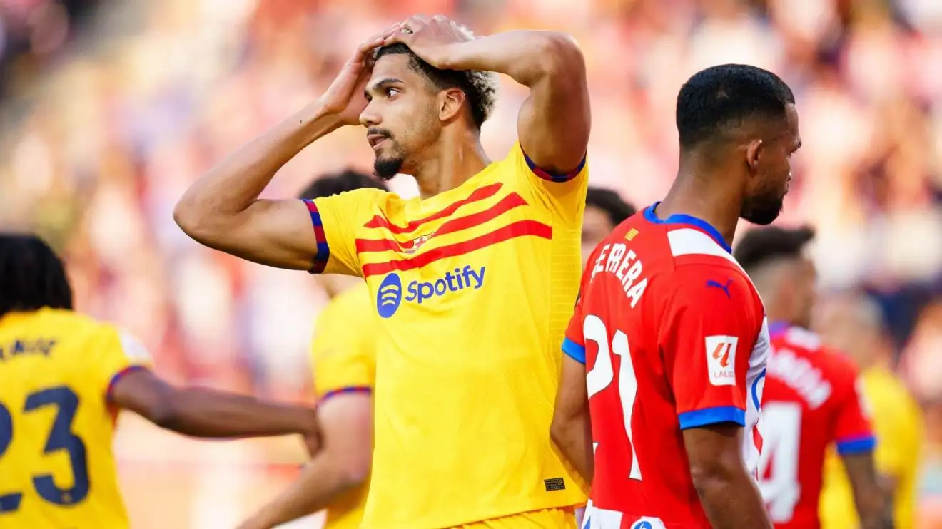 Man Utd £76m double swoop sees them become Barcelona's 'unexpected ally' 1 Barcelona defender Ronald Araujo appearances dejected during a match