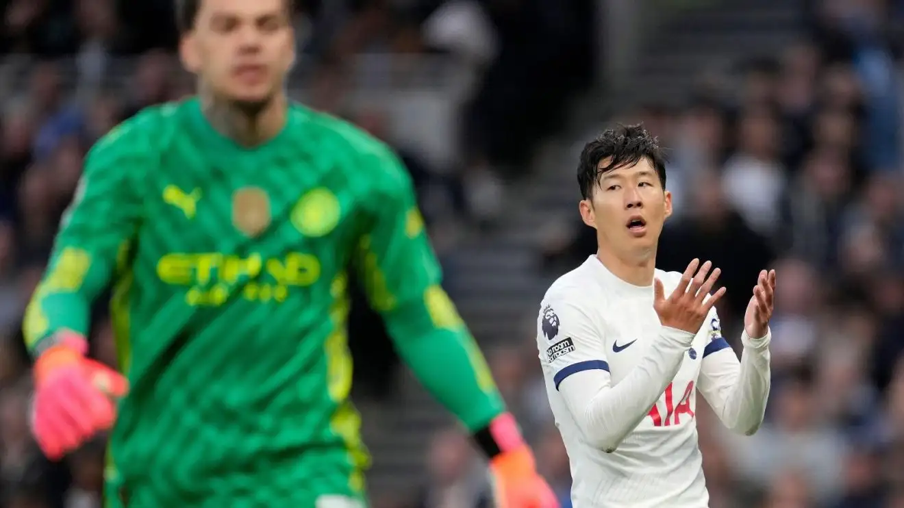 Tottenham captain Heung-minutes Son and also Manchester Municipal goalkeeper Ederson throughout a match