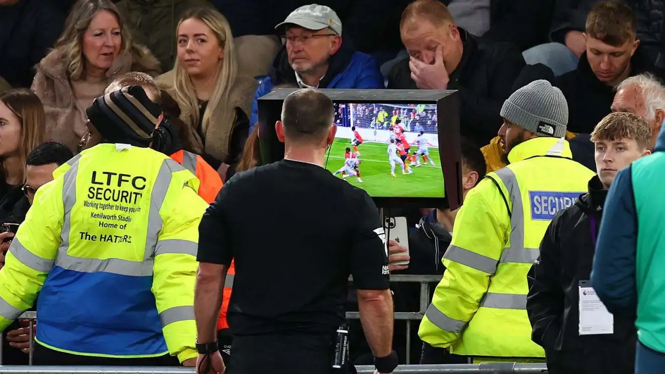 A pitchside video review in progress