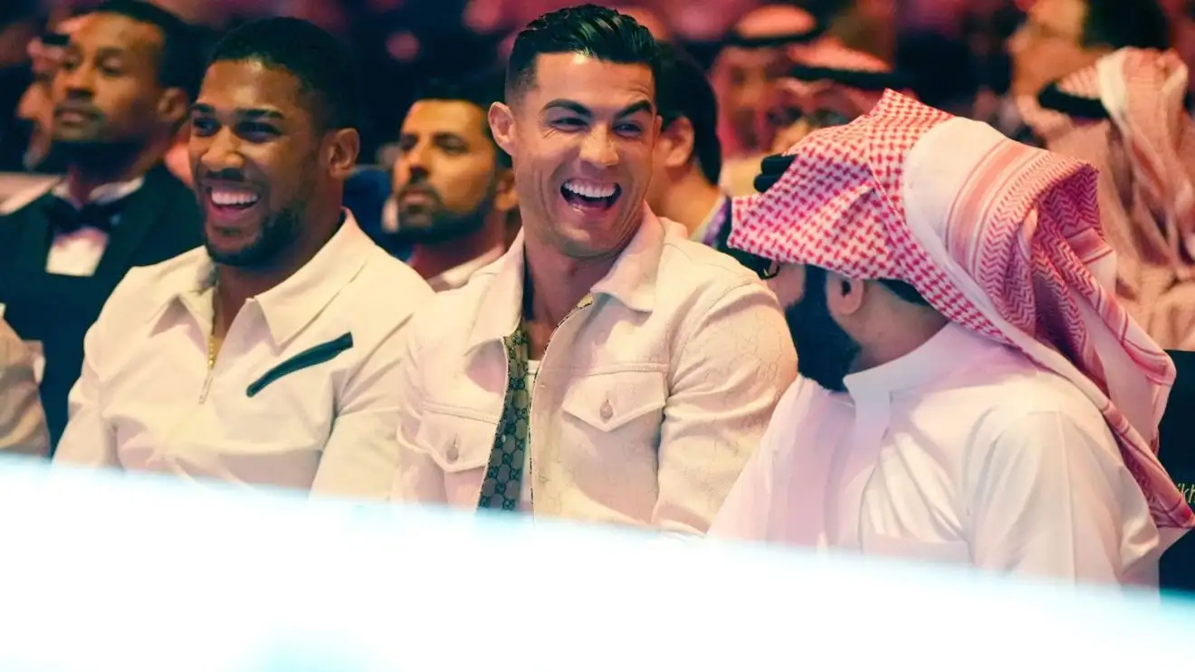 Cristiano Ronaldo laughs ringside previously Usyk v Fierceness