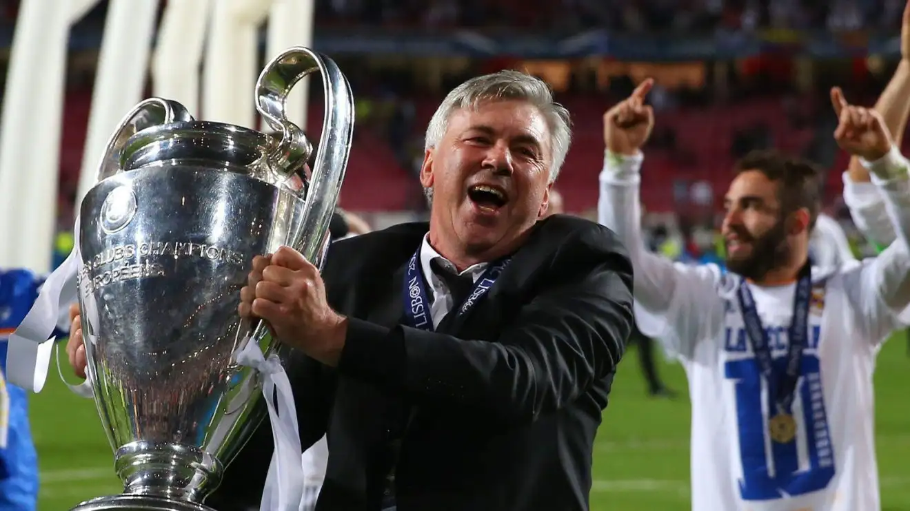 Carlo Ancelotti lifts the Champions League trophy in 2022