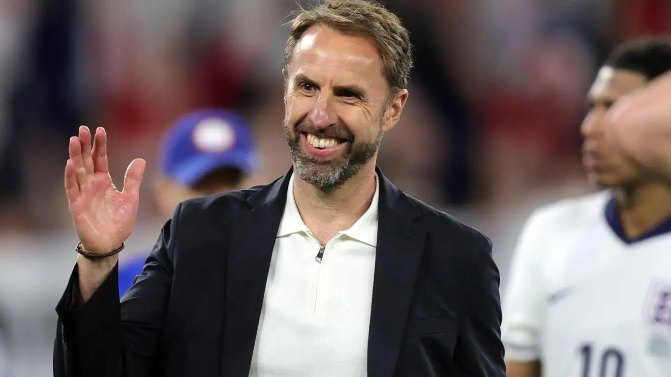 England employer Gareth Southgate smiles after a win