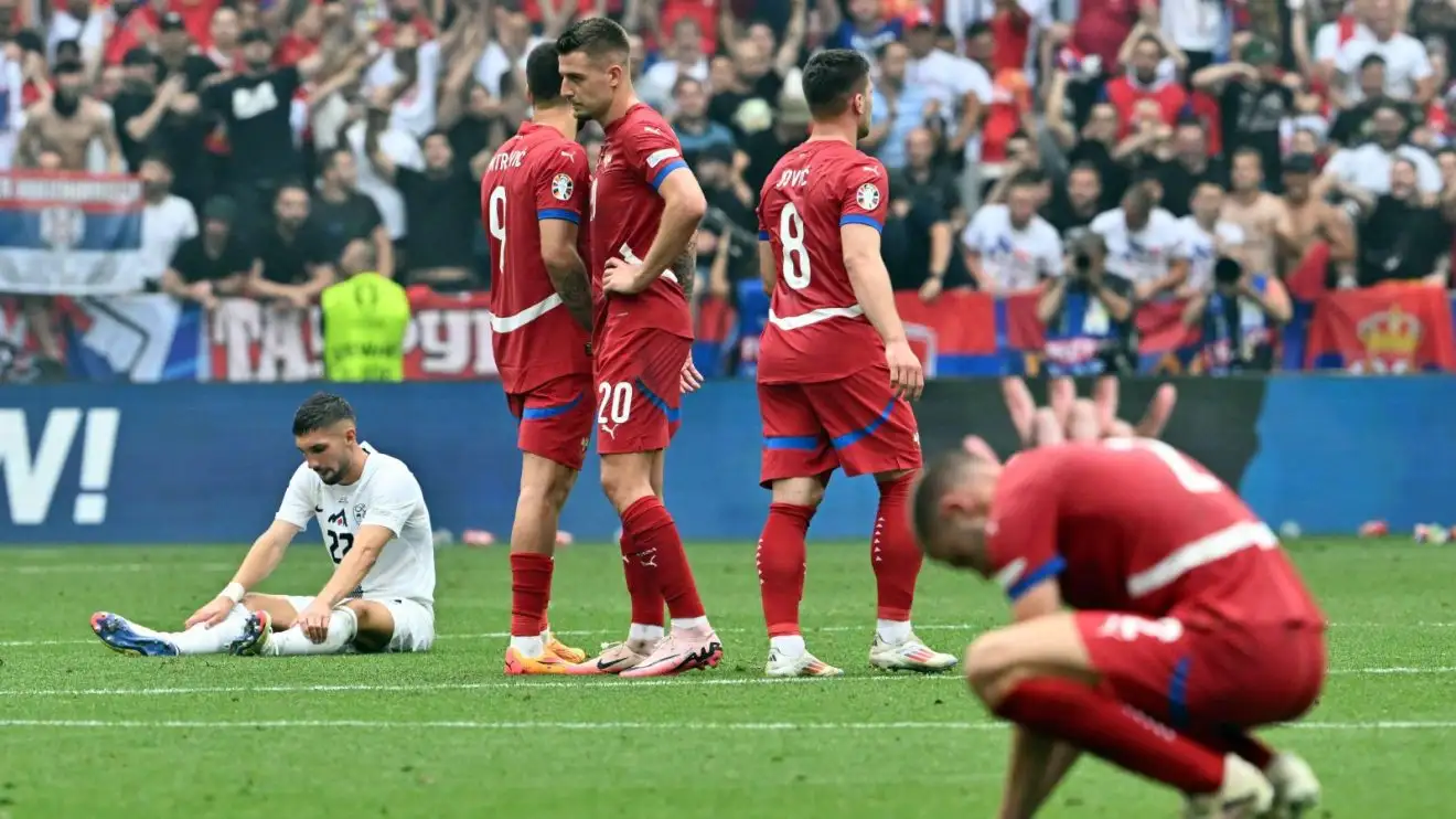 Serbia players celebrate late victory over Slovenia