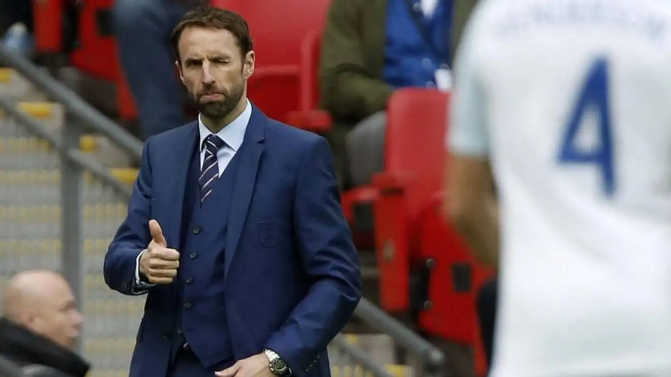 Gareth Southgate gives a thumbs up during his first game in charge of England in 2016.