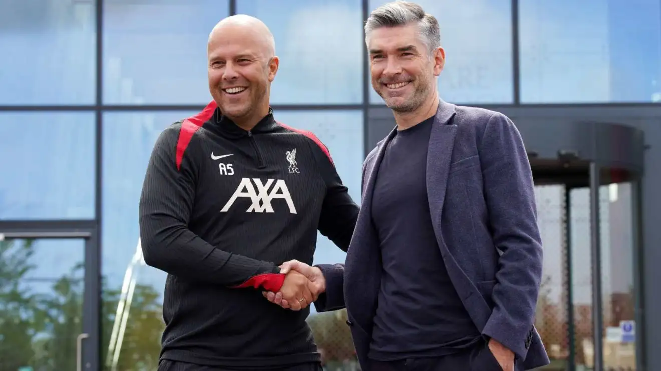 Liverpool head adviser Arne Slot shakes hands by means of Richard Hughes