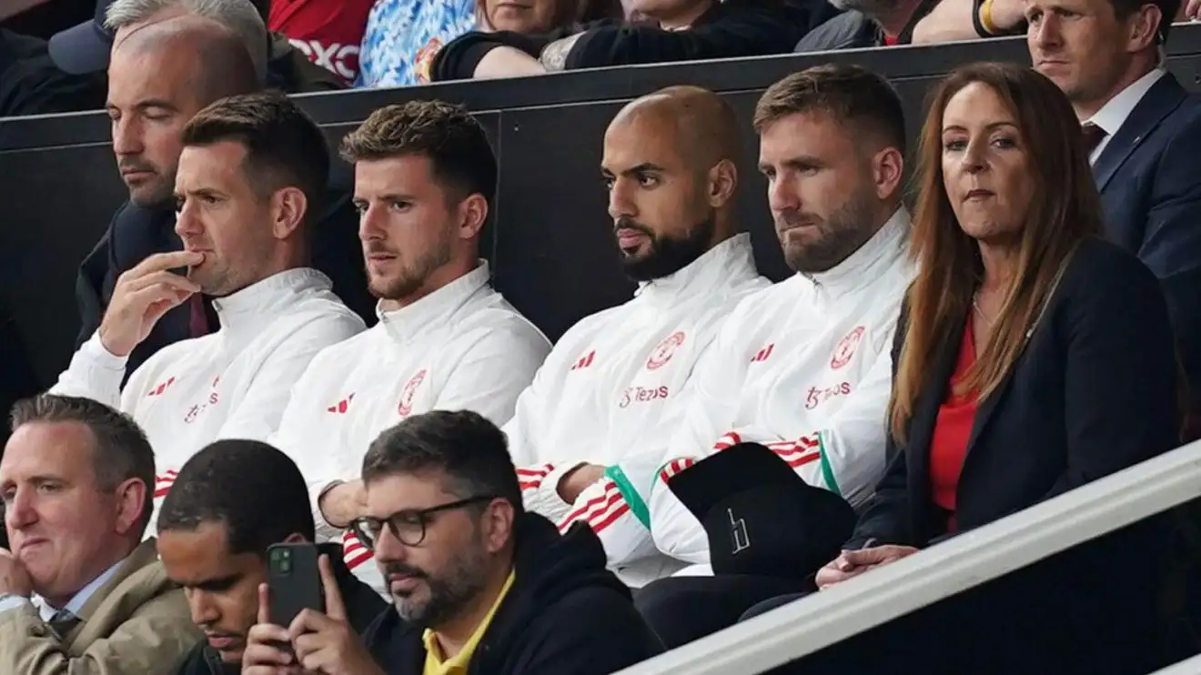 Luke Shaw sits wearing his Male Utd crew-pals