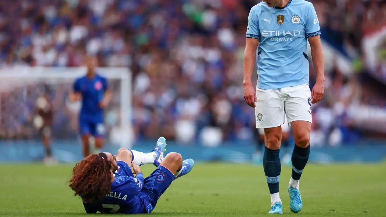 Chelsea protector Marc Cucurella and Erling Haaland